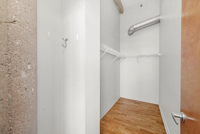 3963 W Belmont Ave Unit 613, Chicago, IL 60618 - spacious closet featuring wood finished floors