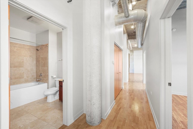 3963 W Belmont Ave Unit 613, Chicago, IL 60618 - corridor featuring light wood finished floors