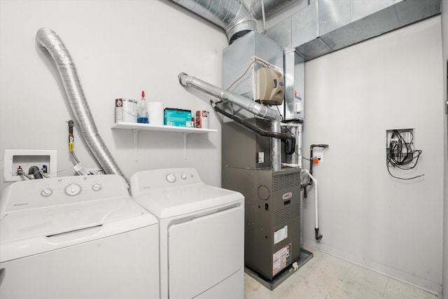 3963 W Belmont Ave Unit 613, Chicago, IL 60618 - laundry room with washer and clothes dryer and heating unit