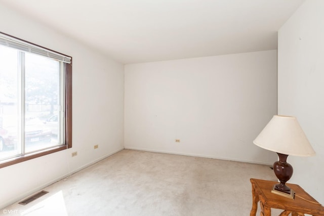 330 Memory Ln Unit 2, Westmont, IL 60559 - empty room featuring healthy amount of natural light and light carpet