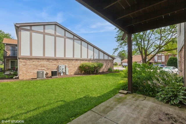 330 Memory Ln Unit 2, Westmont, IL 60559 - view of green lawn featuring a patio area