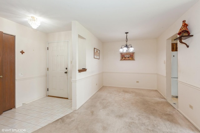 330 Memory Ln Unit 2, Westmont, IL 60559 - unfurnished dining area featuring a chandelier and light colored carpet