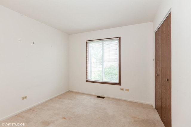 330 Memory Ln Unit 2, Westmont, IL 60559 - empty room featuring light colored carpet and baseboards
