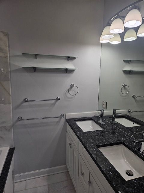 2447 W Walton St Unit 2, Chicago, IL 60622 - bathroom featuring double vanity, a tub, and tile patterned floors