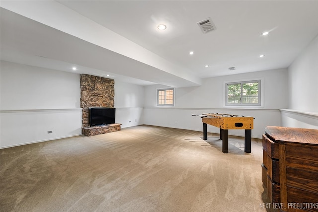 24106 W Pheasant Chase Dr, Plainfield, IL 60544 - playroom featuring light colored carpet, a fireplace, and recessed lighting