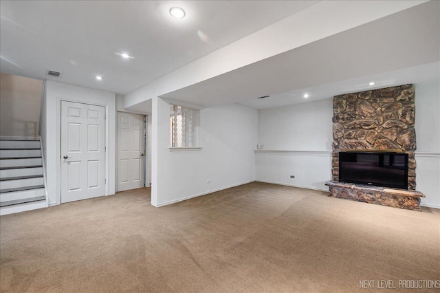 24106 W Pheasant Chase Dr, Plainfield, IL 60544 - unfurnished living room with carpet, stairway, recessed lighting, and a stone fireplace