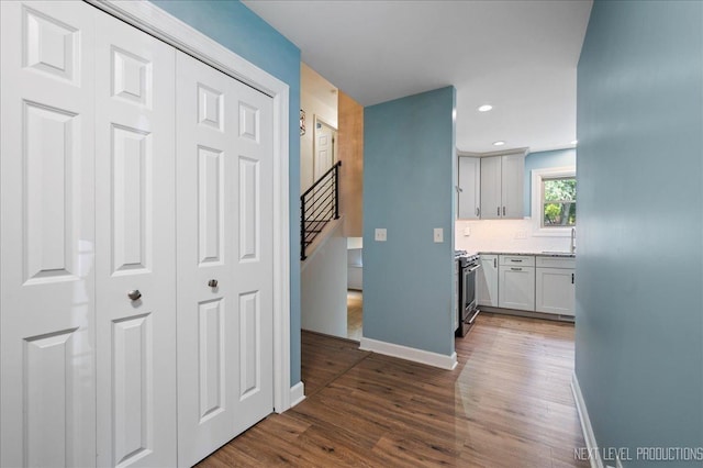 24106 W Pheasant Chase Dr, Plainfield, IL 60544 - hall with dark wood-style floors, recessed lighting, and stairway