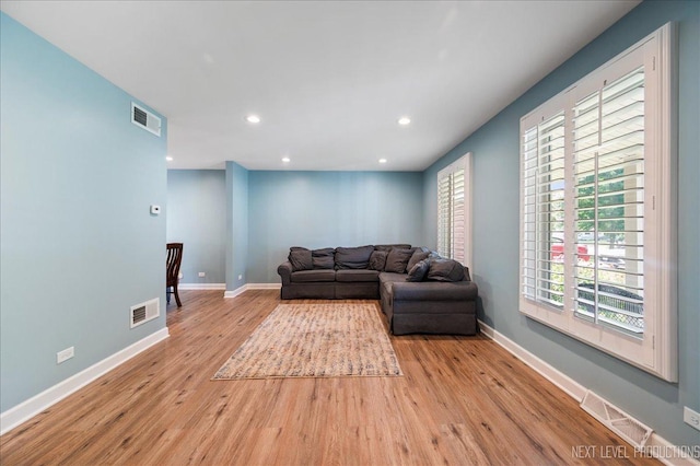 24106 W Pheasant Chase Dr, Plainfield, IL 60544 - living room featuring wood finished floors and recessed lighting