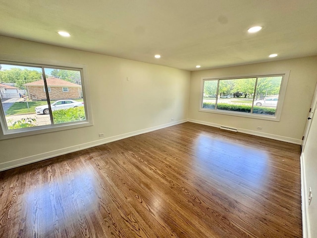 837 Wilcox Ave, Mundelein, IL 60060 - spare room featuring dark wood-type flooring and recessed lighting