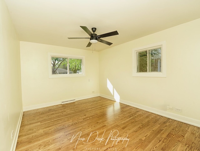 837 Wilcox Ave, Mundelein, IL 60060 - empty room with wood finished floors and ceiling fan
