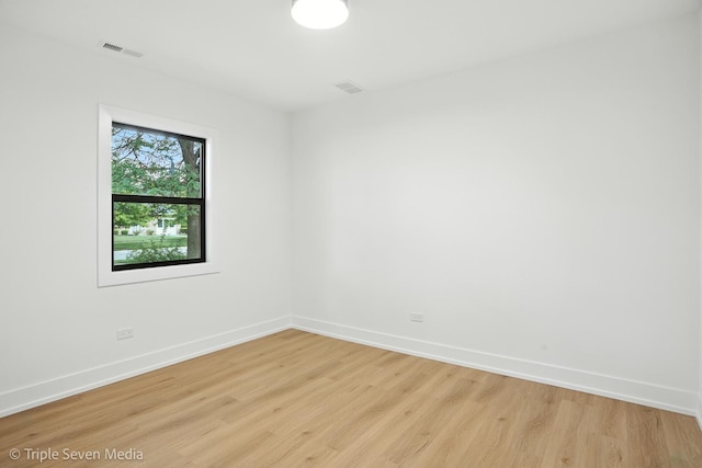 8100 Lockwood Ave, Burbank, IL 60459 - spare room with light wood-style floors and baseboards