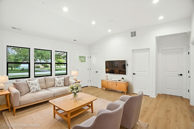 8100 Lockwood Ave, Burbank, IL 60459 - living room with light wood-type flooring, vaulted ceiling, and recessed lighting
