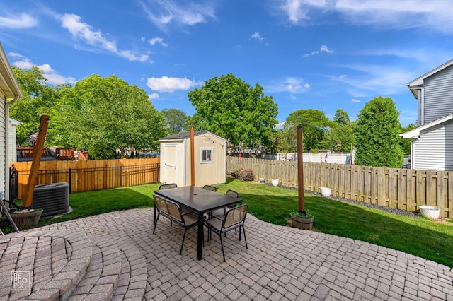 417 Chadsford Ct, Carol Stream, IL 60188 - fenced backyard with a patio area, a storage shed, and outdoor dining area
