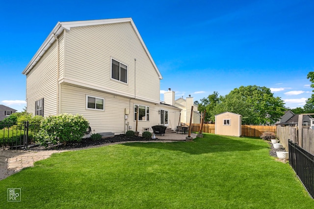 417 Chadsford Ct, Carol Stream, IL 60188 - rear view of property featuring a patio area, a fenced backyard, and a storage shed