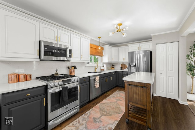 417 Chadsford Ct, Carol Stream, IL 60188 - kitchen with stainless steel appliances, white cabinets, crown molding, gray cabinetry, and dark wood-type flooring