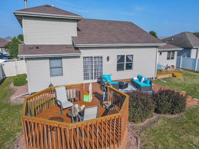 2069 Willow Brook Dr, Bourbonnais, IL 60914 - back of property with an outdoor hangout area, a deck, roof with shingles, and a fenced backyard