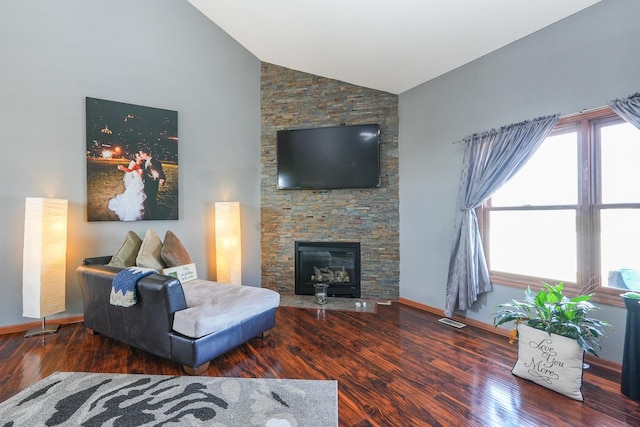 2069 Willow Brook Dr, Bourbonnais, IL 60914 - living area with high vaulted ceiling, wood finished floors, and a stone fireplace