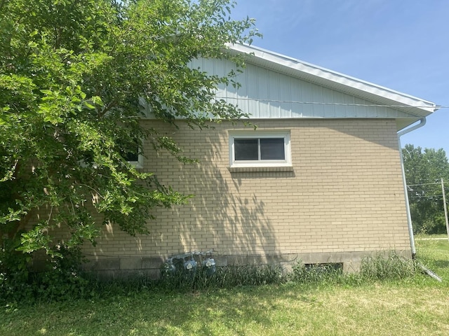 217-219 Mulvain St, Durand, IL 61024 - view of side of home featuring brick siding