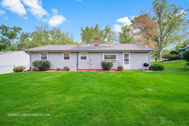 1607 Warwick Ln, Schaumburg, IL 60193 - rear view of house featuring a chimney