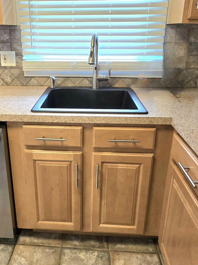 1607 Warwick Ln, Schaumburg, IL 60193 - kitchen view of tasteful backsplash, dishwasher, and light countertops