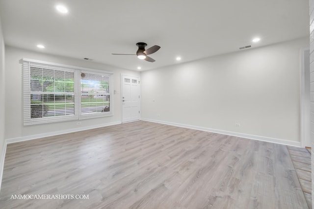 1607 Warwick Ln, Schaumburg, IL 60193 - spare room featuring ceiling fan, light wood-style floors, and recessed lighting