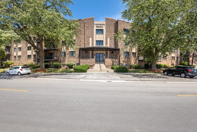 7100 W 95th St Unit 110, Oak Lawn, IL 60453 - view of front of property with stone siding