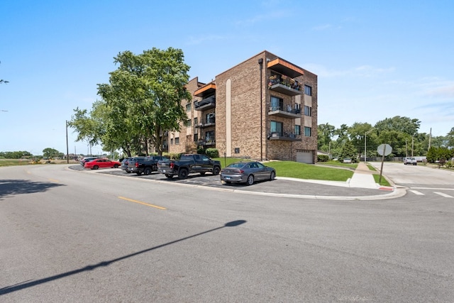 7100 W 95th St Unit 110, Oak Lawn, IL 60453 - view of property featuring uncovered parking