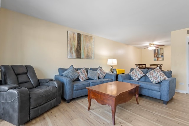 7100 W 95th St Unit 110, Oak Lawn, IL 60453 - living area with light wood-type flooring and a ceiling fan