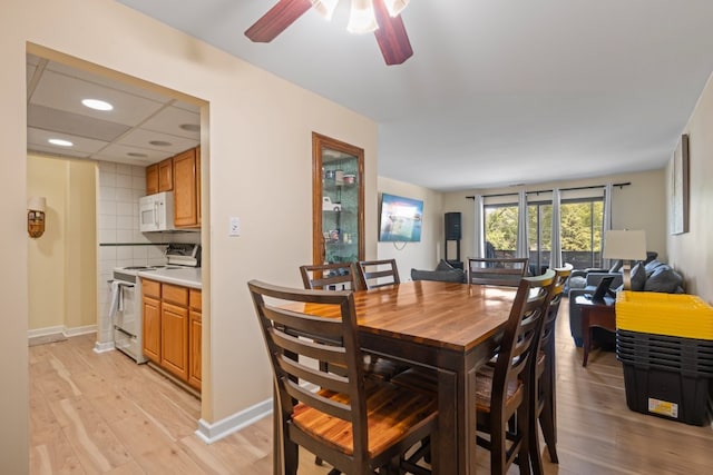 7100 W 95th St Unit 110, Oak Lawn, IL 60453 - dining area with light wood-type flooring, a ceiling fan, and recessed lighting