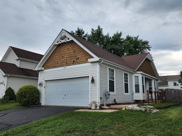 1036 Georgian Pl, Bartlett, IL 60103 - view of front of home with an attached garage and asphalt driveway