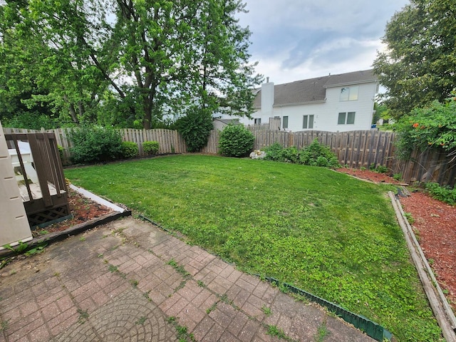 1036 Georgian Pl, Bartlett, IL 60103 - fenced backyard featuring a patio area