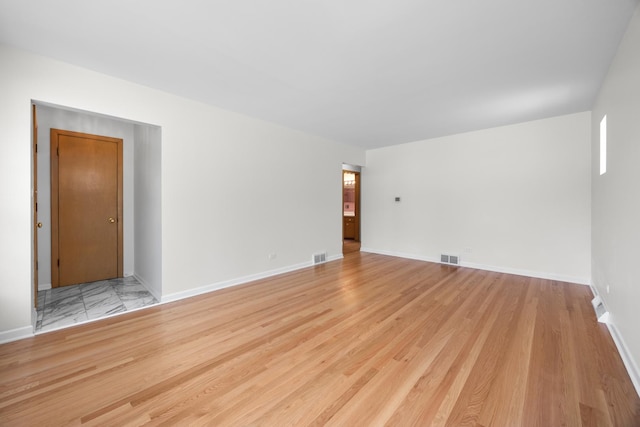 4316 N Sayre Ave, Norridge, IL 60706 - spare room featuring baseboards and light wood finished floors