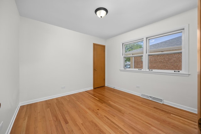 4316 N Sayre Ave, Norridge, IL 60706 - empty room with light wood-style floors and baseboards
