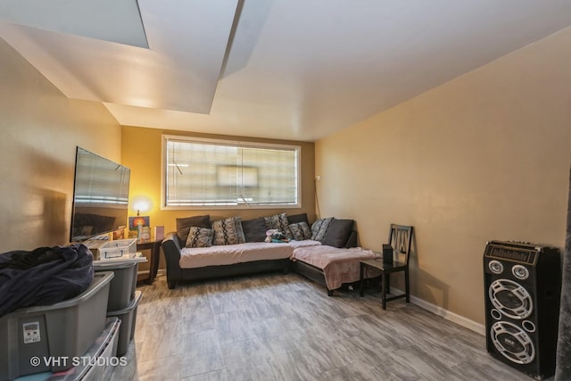 13937 S School St, Riverdale, IL 60827 - living room featuring baseboards and wood finished floors