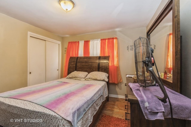 13937 S School St, Riverdale, IL 60827 - bedroom featuring wood finished floors and a closet