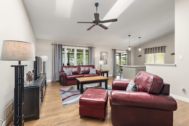 16243 Hummingbird Hill Dr, Orland Park, IL 60467 - living area with lofted ceiling, a ceiling fan, and light wood-style floors