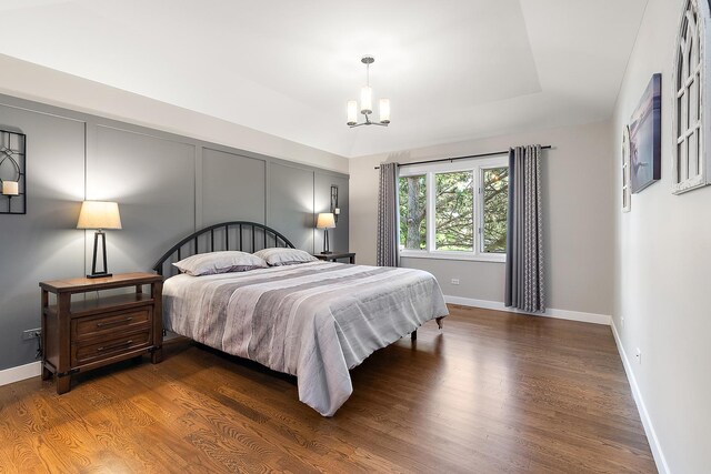 16243 Hummingbird Hill Dr, Orland Park, IL 60467 - bedroom featuring a chandelier and wood finished floors
