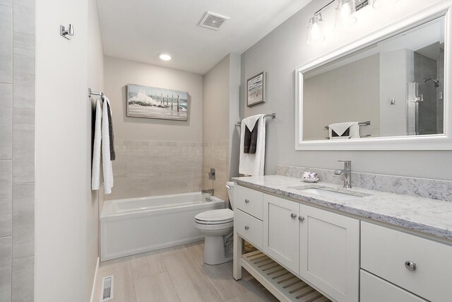 16243 Hummingbird Hill Dr, Orland Park, IL 60467 - bathroom featuring vanity, a tub, and recessed lighting