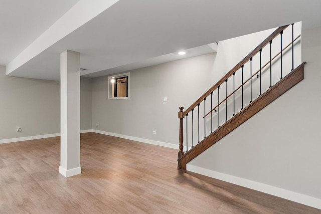 16243 Hummingbird Hill Dr, Orland Park, IL 60467 - finished basement with wood finished floors, recessed lighting, and stairway