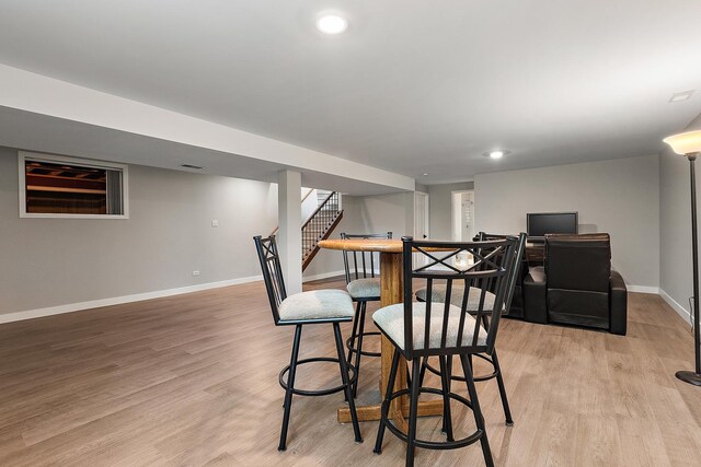 16243 Hummingbird Hill Dr, Orland Park, IL 60467 - dining area featuring light wood-style flooring, stairway, and recessed lighting