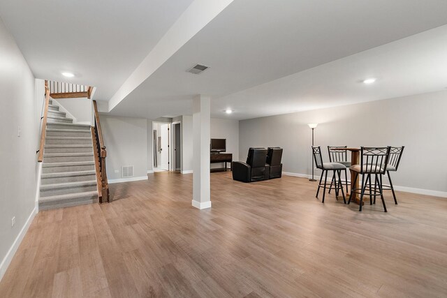 16243 Hummingbird Hill Dr, Orland Park, IL 60467 - dining room featuring light wood-type flooring, stairway, and recessed lighting
