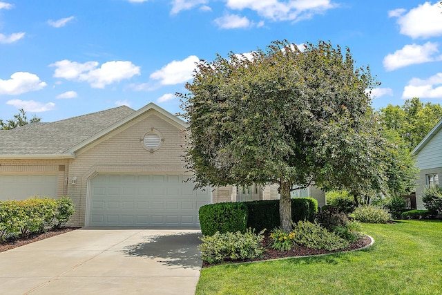 16243 Hummingbird Hill Dr, Orland Park, IL 60467 - view of front of property with driveway, a front yard, brick siding, an attached garage, and roof with shingles
