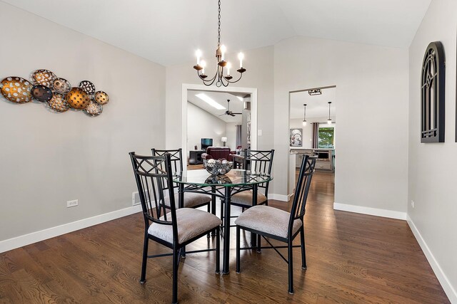 16243 Hummingbird Hill Dr, Orland Park, IL 60467 - dining space with vaulted ceiling, dark wood finished floors, and a chandelier