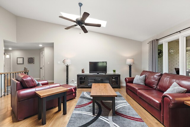 16243 Hummingbird Hill Dr, Orland Park, IL 60467 - living area featuring light wood finished floors, a ceiling fan, and high vaulted ceiling