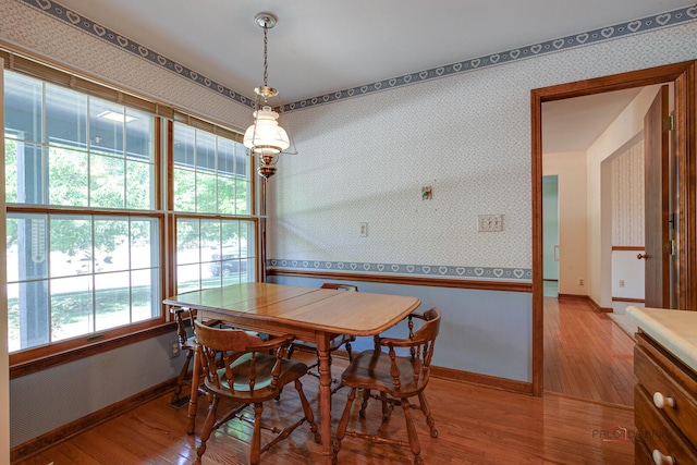 400 Seafarer Dr, Third Lake, IL 60030 - dining area with wallpapered walls and light wood finished floors