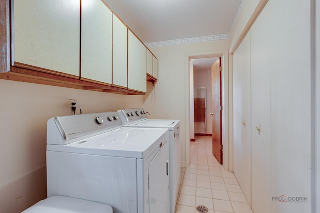400 Seafarer Dr, Third Lake, IL 60030 - laundry room featuring cabinet space, separate washer and dryer, and light tile patterned floors