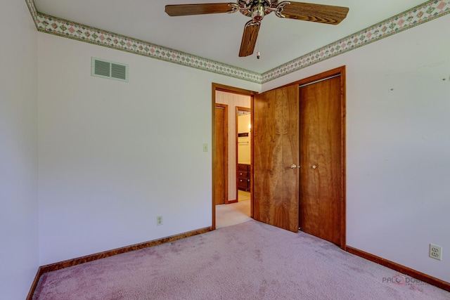 400 Seafarer Dr, Third Lake, IL 60030 - unfurnished bedroom featuring carpet floors, a closet, and ceiling fan