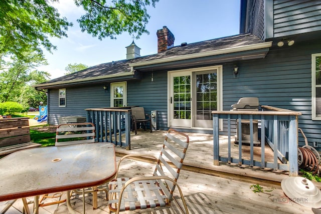400 Seafarer Dr, Third Lake, IL 60030 - deck with outdoor dining area and a grill