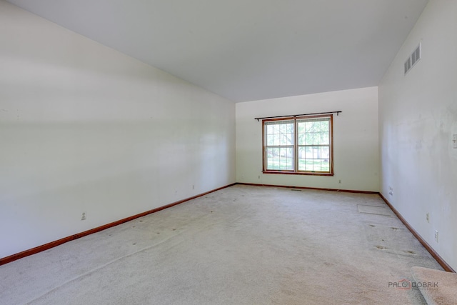 400 Seafarer Dr, Third Lake, IL 60030 - carpeted empty room featuring baseboards and vaulted ceiling