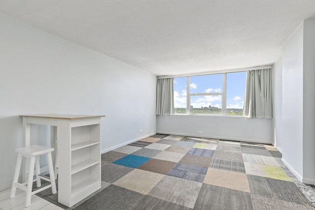 7234 W N Ave Unit 1203, Elmwood Park, IL 60707 - spare room featuring baseboards